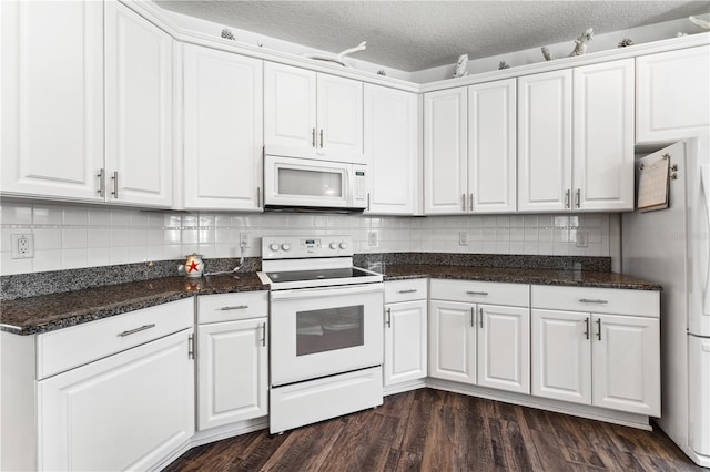 kitchen featuring white cabinets, white appliances, dark wood-type flooring, tasteful backsplash, and a textured ceiling