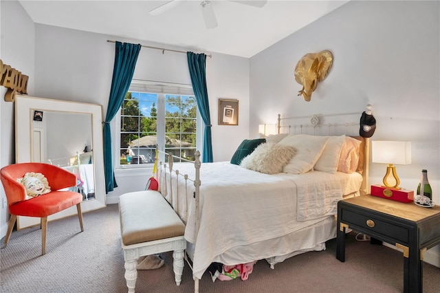 carpeted bedroom with lofted ceiling and ceiling fan