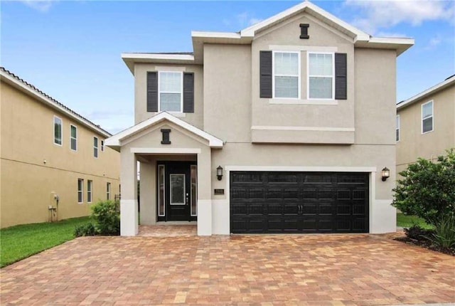 view of front of home with a garage