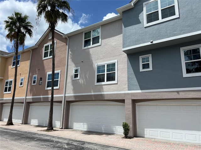 exterior space with a garage