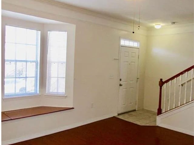 entrance foyer with crown molding