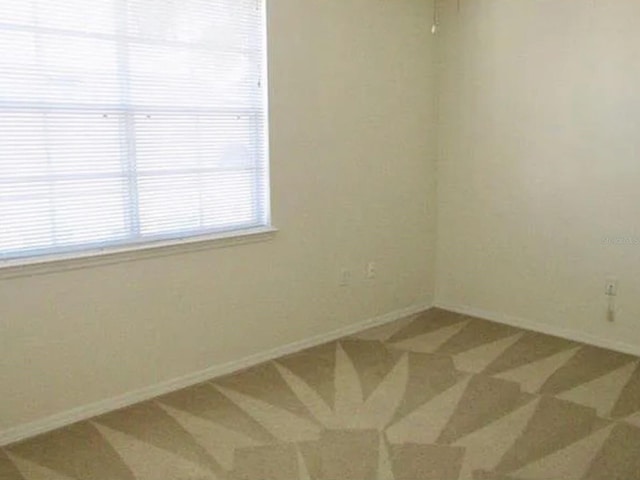 empty room featuring carpet