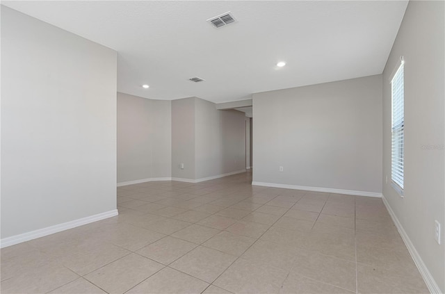 208 Hyacinth Ct, Kissimmee, FL 34759 - spare room featuring light tile patterned flooring, recessed lighting, and baseboards
