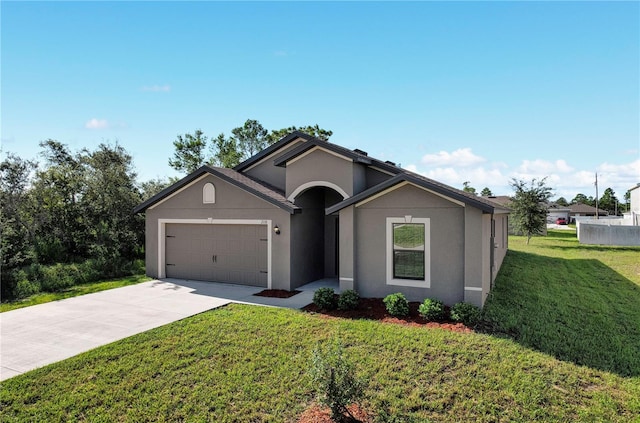 single story home with a front lawn and a garage