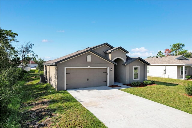 single story home with cooling unit, a front lawn, and a garage