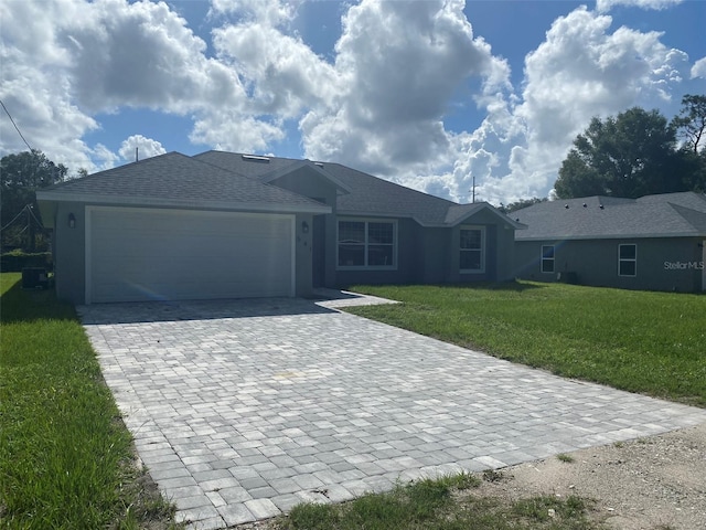 ranch-style home with a front lawn and a garage