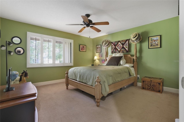 bedroom with ceiling fan and carpet flooring