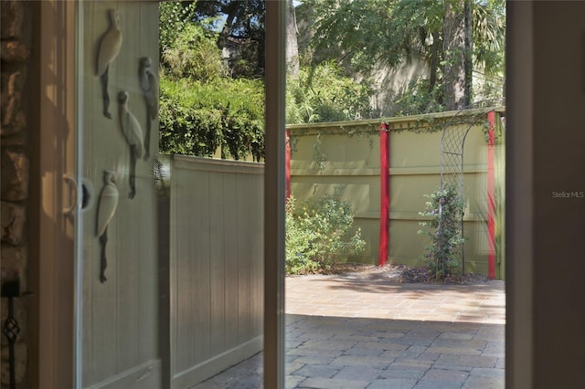 entryway featuring brick floor