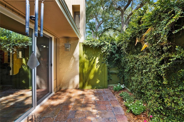 view of property exterior featuring a patio area and stucco siding