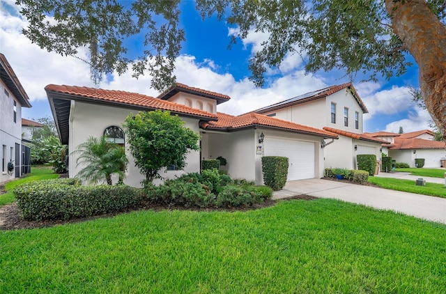 mediterranean / spanish-style home featuring a front lawn