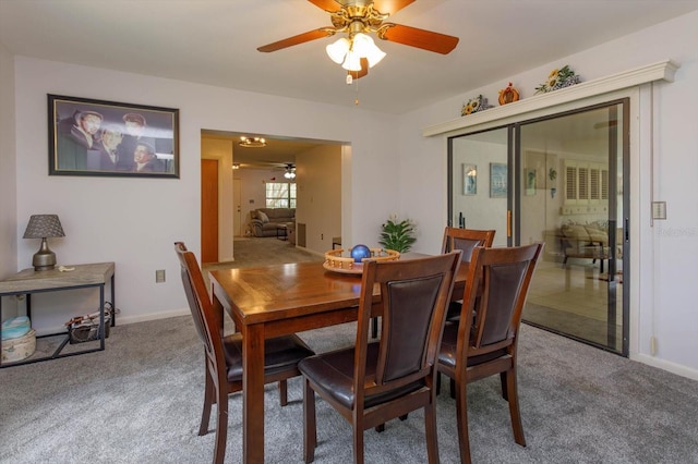 dining room featuring carpet floors and ceiling fan