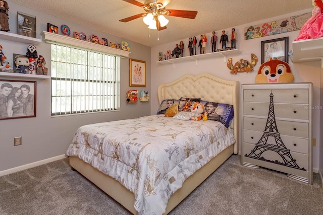 bedroom featuring ceiling fan, carpet floors, and a textured ceiling