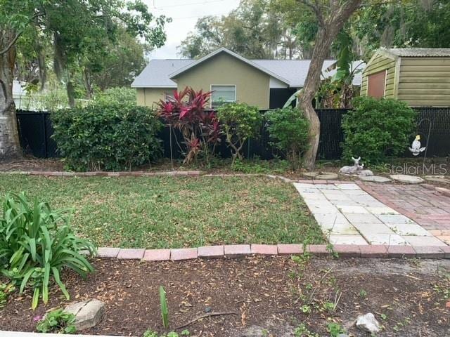 view of yard with a patio area