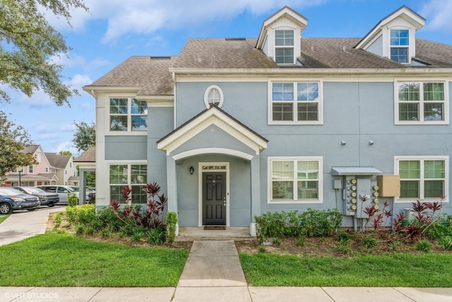 view of front facade with a front yard