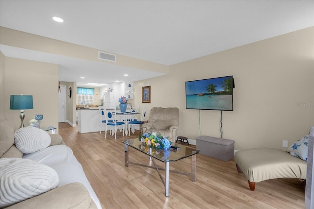 living room featuring light hardwood / wood-style flooring