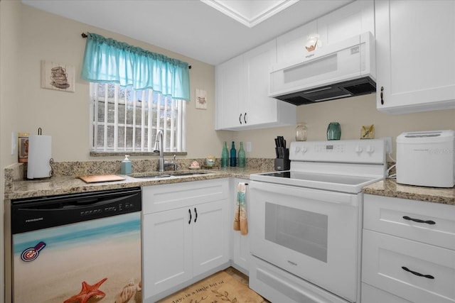 kitchen featuring light stone counters, sink, white appliances, and white cabinetry