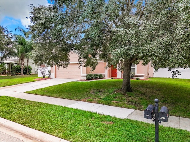 obstructed view of property featuring a front yard