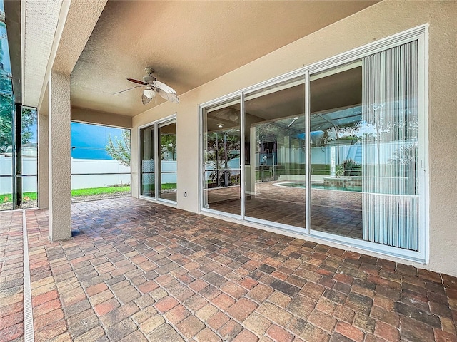 view of patio / terrace featuring ceiling fan