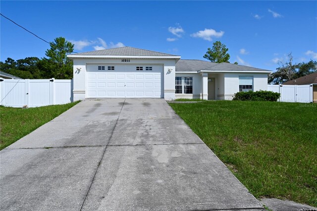 10255 Norwick St, Spring Hill, FL 34608 - ranch-style house featuring a front yard, a gate, and driveway
