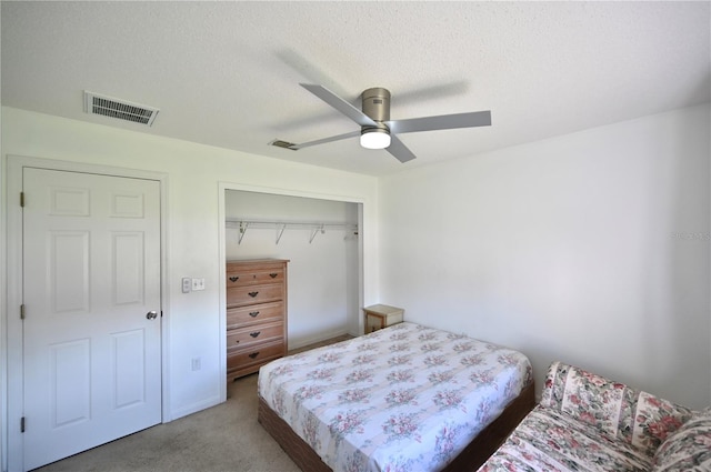 10255 Norwick St, Spring Hill, FL 34608 - carpeted bedroom featuring a closet, visible vents, a textured ceiling, and ceiling fan