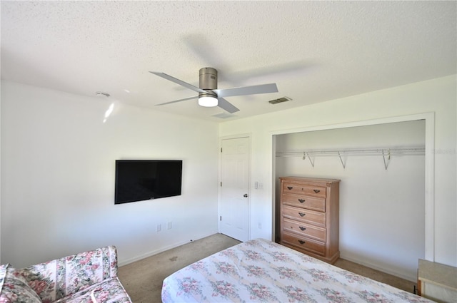 10255 Norwick St, Spring Hill, FL 34608 - bedroom with a ceiling fan, visible vents, carpet floors, a closet, and a textured ceiling