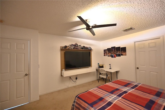 10255 Norwick St, Spring Hill, FL 34608 - bedroom featuring visible vents, a textured ceiling, carpet, and a ceiling fan