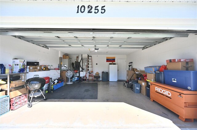 garage featuring white refrigerator