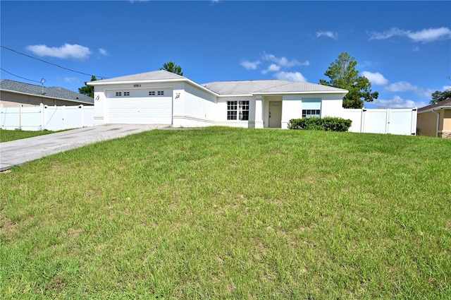 10255 Norwick St, Spring Hill, FL 34608 - single story home featuring a front lawn, fence, concrete driveway, an attached garage, and a gate