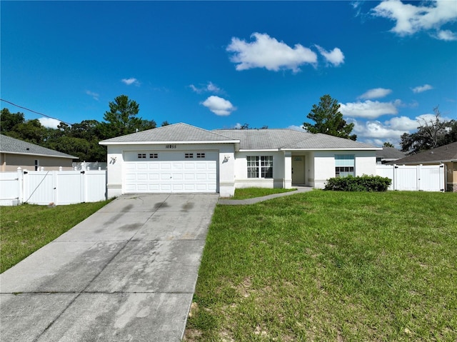 10255 Norwick St, Spring Hill, FL 34608 - single story home featuring a front lawn, a gate, and concrete driveway