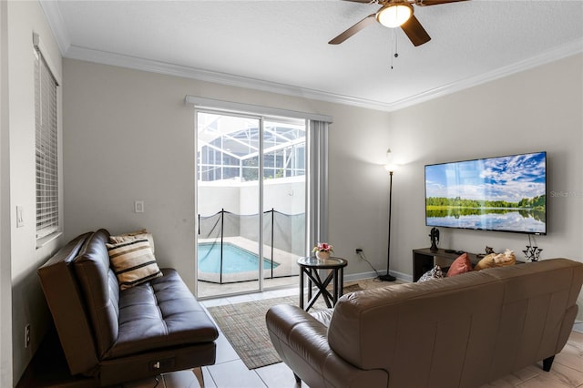 living room featuring crown molding and ceiling fan