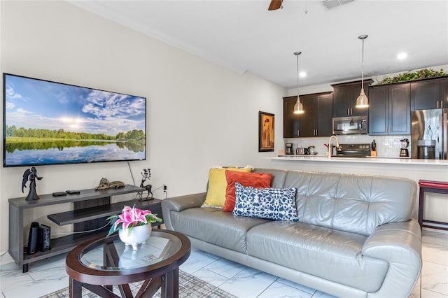 living room with ceiling fan