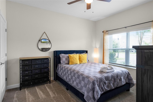 carpeted bedroom featuring ceiling fan