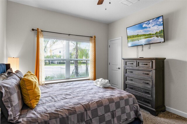1224 Challenge Dr, Davenport, FL 33896 - carpeted bedroom featuring baseboards, ceiling fan, and visible vents