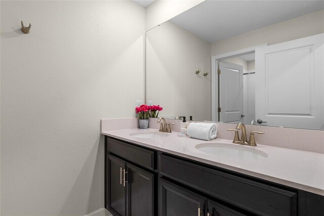 1224 Challenge Dr, Davenport, FL 33896 - bathroom with double vanity and a sink