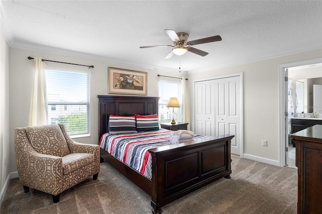 bedroom featuring ensuite bathroom, ceiling fan, carpet floors, and multiple windows