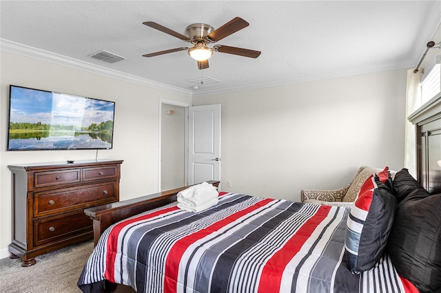 carpeted bedroom featuring crown molding and ceiling fan