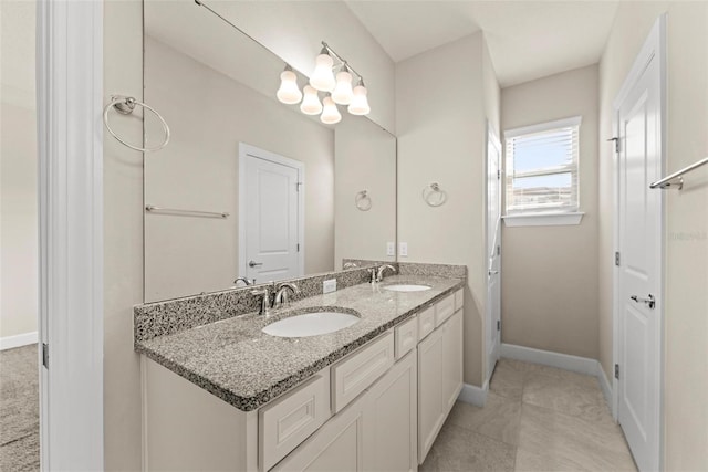 bathroom featuring tile patterned floors and vanity