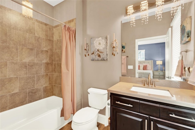 full bathroom with vanity, toilet, and shower / bathtub combination with curtain