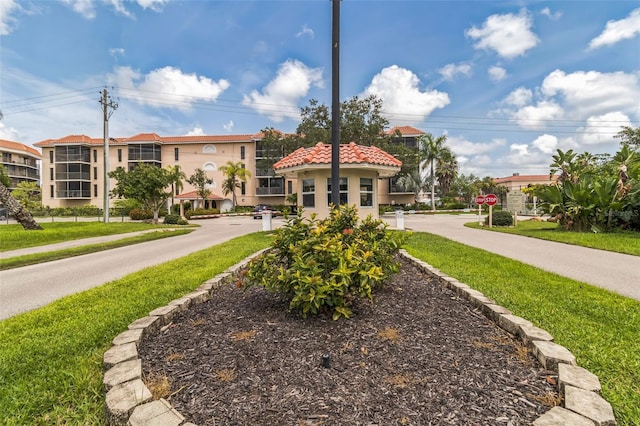 view of community featuring a lawn