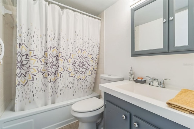 full bathroom with vanity, toilet, and shower / tub combo with curtain