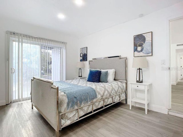 bedroom featuring light hardwood / wood-style flooring