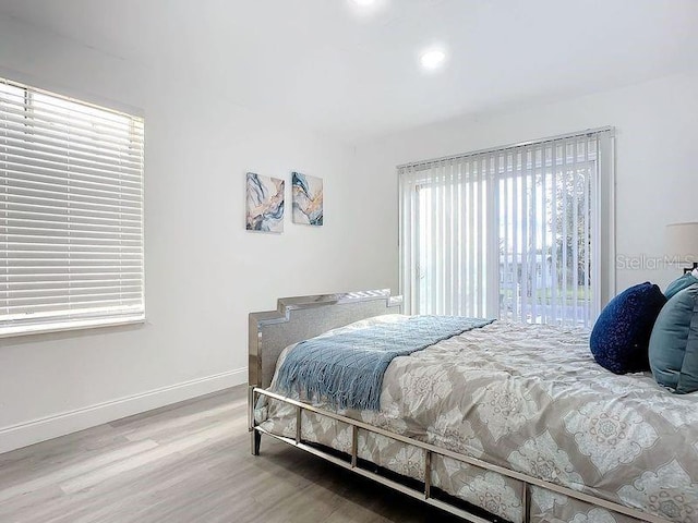 bedroom featuring hardwood / wood-style flooring