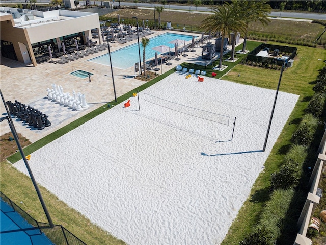 view of swimming pool featuring a yard and a patio