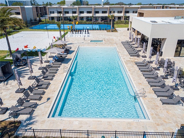 view of pool featuring a patio