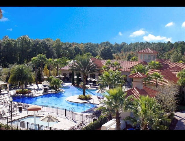 view of swimming pool with a patio area