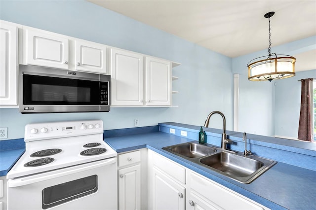 kitchen with a sink, white cabinetry, stainless steel microwave, and white range with electric cooktop