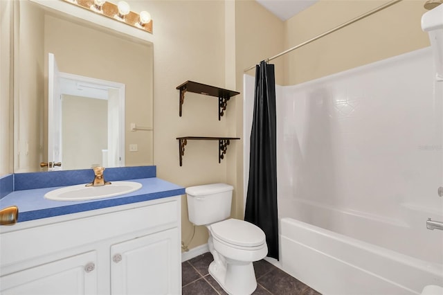 bathroom featuring tile patterned flooring, vanity, toilet, and shower / bath combo with shower curtain