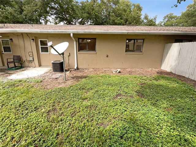 rear view of property featuring a patio area