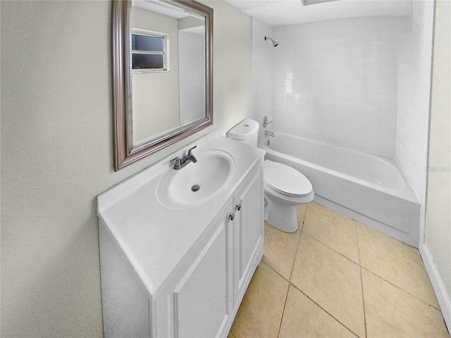 full bathroom featuring vanity, toilet, tile patterned floors, and tiled shower / bath