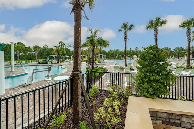 view of swimming pool with a patio